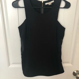 Black tank with gold zipper detail